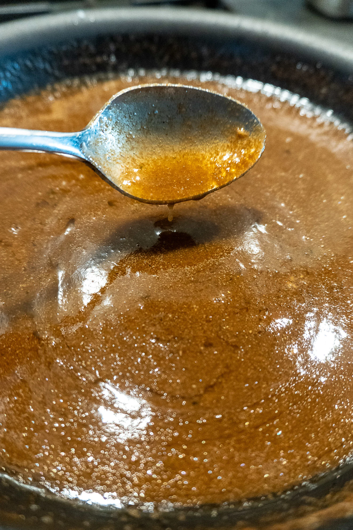 seasoning butter sauce for chex mix in a skillet