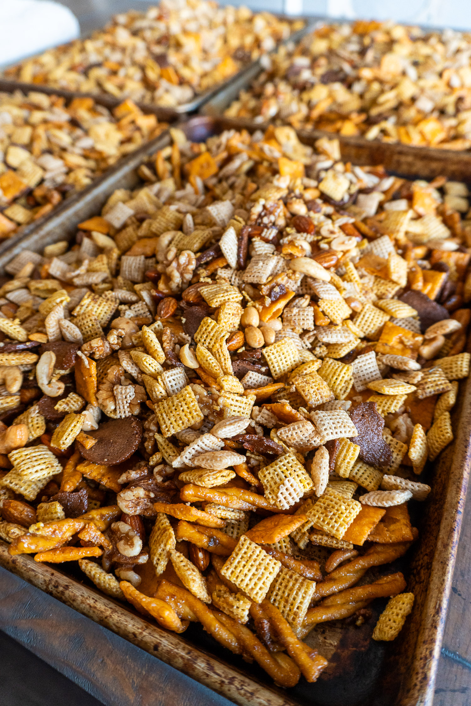 chex mix with a hint of smoke on cookie sheets for easy cleanup