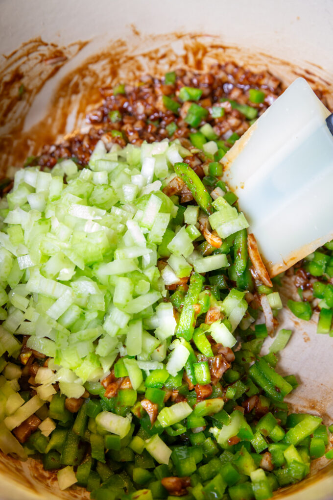 adding the clery and onion to the brown red roux