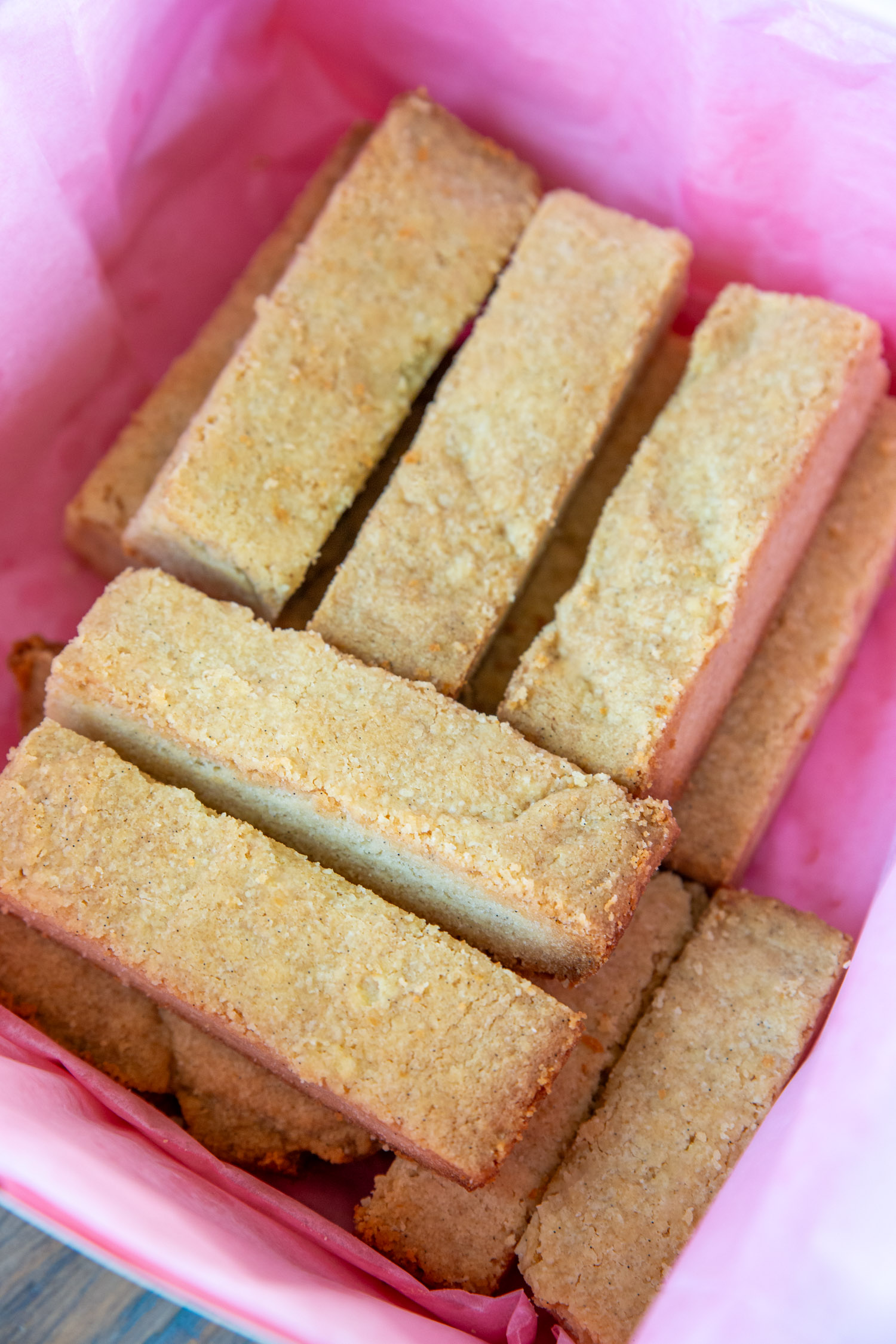 A pink biscuit box filled with our official recipe of shortbreads