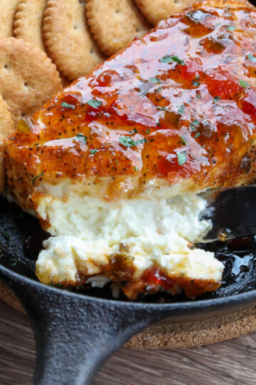 Smoked cream cheese on a skillet with white interior.