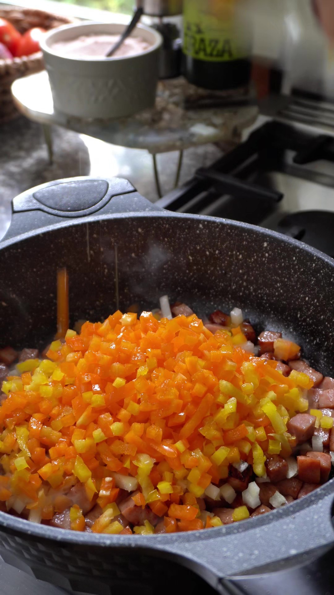 diced bell pepper added to the pot