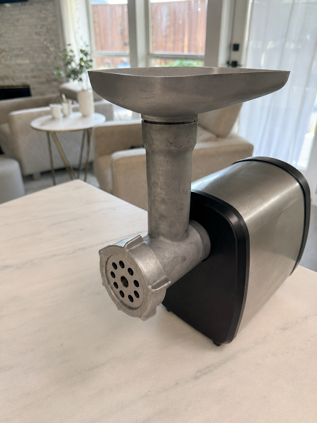 a simple beef grinder in a modern kitchen.