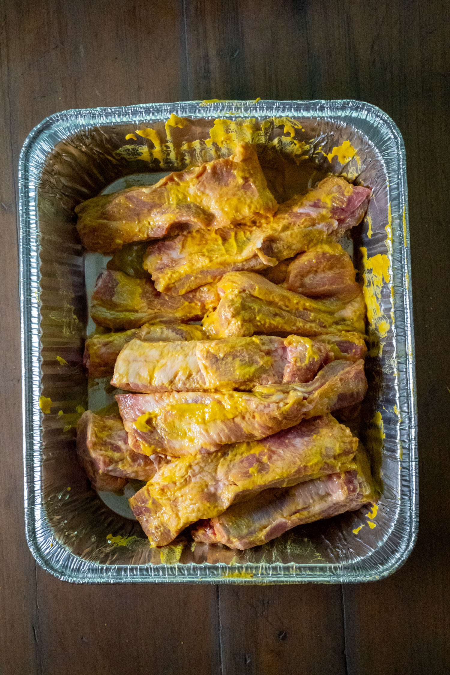 riblets covered in mustard as a binder